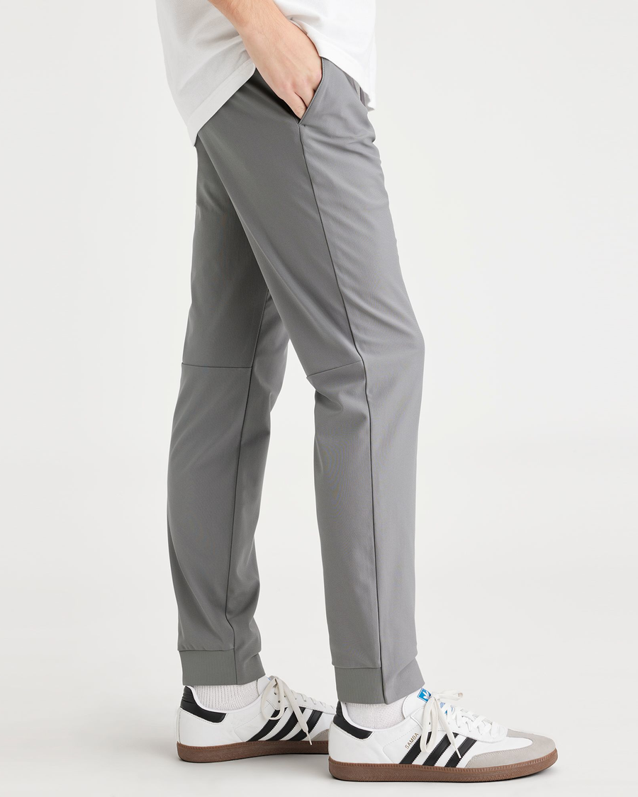 Side view of model wearing Sharkskin Men's Slim Fit Go Jogger Pants.