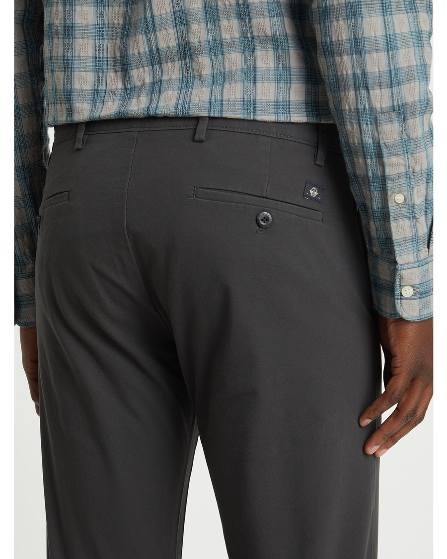 View of model wearing Steelhead Crafted Khaki Pants, Slim Tapered Fit.