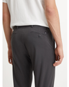 View of model wearing Steelhead Men's Slim Fit Smart 360 Flex Alpha Chino Pants.