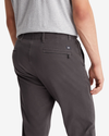 View of model wearing Steelhead Men's Slim Fit Smart 360 Flex Alpha Khaki Pants.