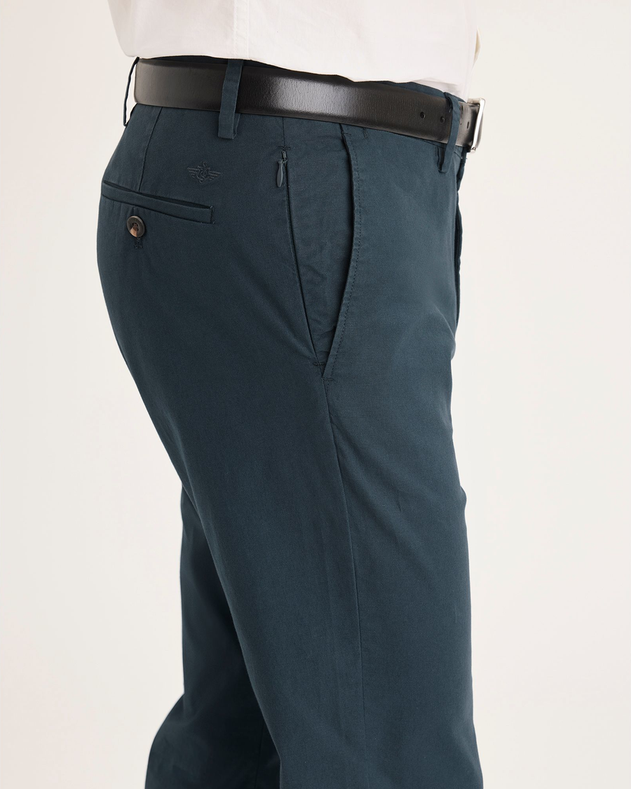 Side view of model wearing Stratified Sea Crafted Khaki Pants, Slim Fit.