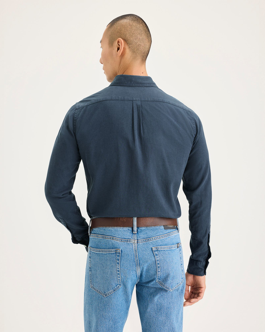 Back view of model wearing Stratified Sea Men's Slim Fit Icon Button Up Shirt.