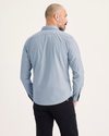 Back view of model wearing Subdued Blue Ultimate Shirt, Slim Fit.