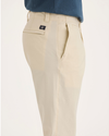 Side view of model wearing Summer Earth Alpha Chino Pants, Skinny Fit.