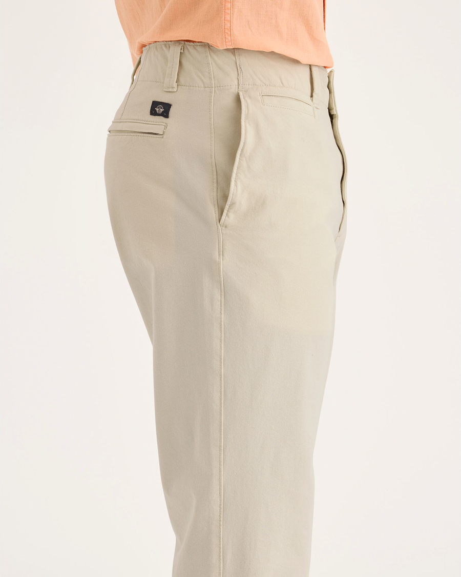 Side view of model wearing Summer Earth Alpha Chino Pants, Slim Fit.