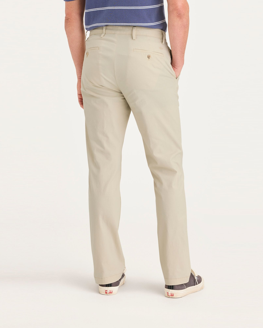 Back view of model wearing Summer Earth Men's Slim Fit Smart 360 Flex Alpha Chino Pants.