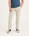 Front view of model wearing Summer Earth Men's Slim Tapered Fit Cargo Pants.