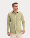 Front view of model wearing Tea Icon Button Up Shirt, Slim Fit.