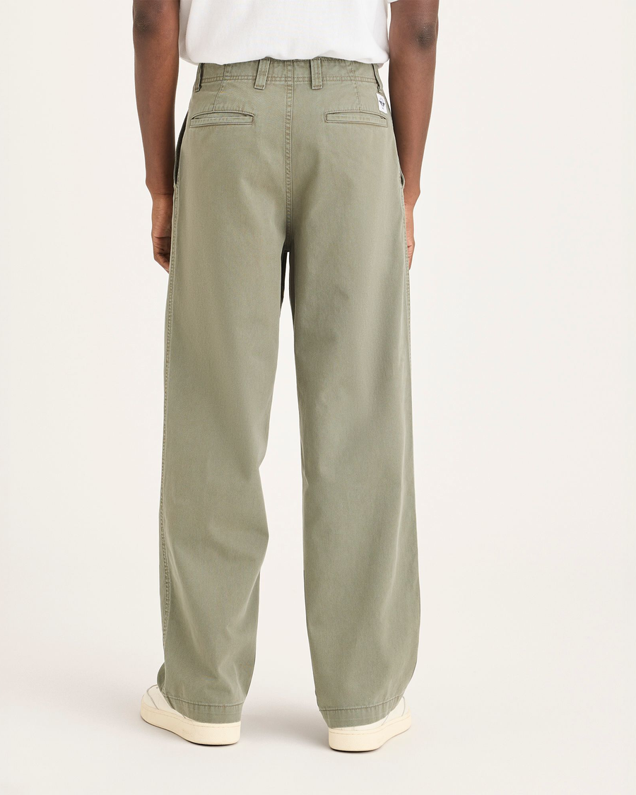 Back view of model wearing Tea Leaf Eighty-Six Alpha Chino Pants, Loose Fit.