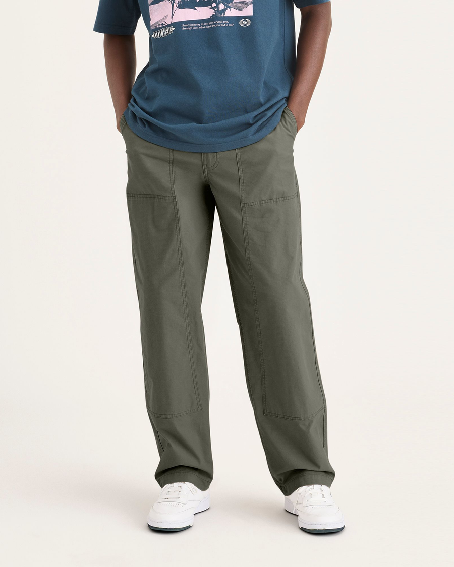 Front view of model wearing Tea Leaf Men's Loose Fit Eighty-Six Utility Pants.