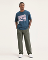 Front view of model wearing Tea Leaf Men's Loose Fit Eighty-Six Utility Pants.