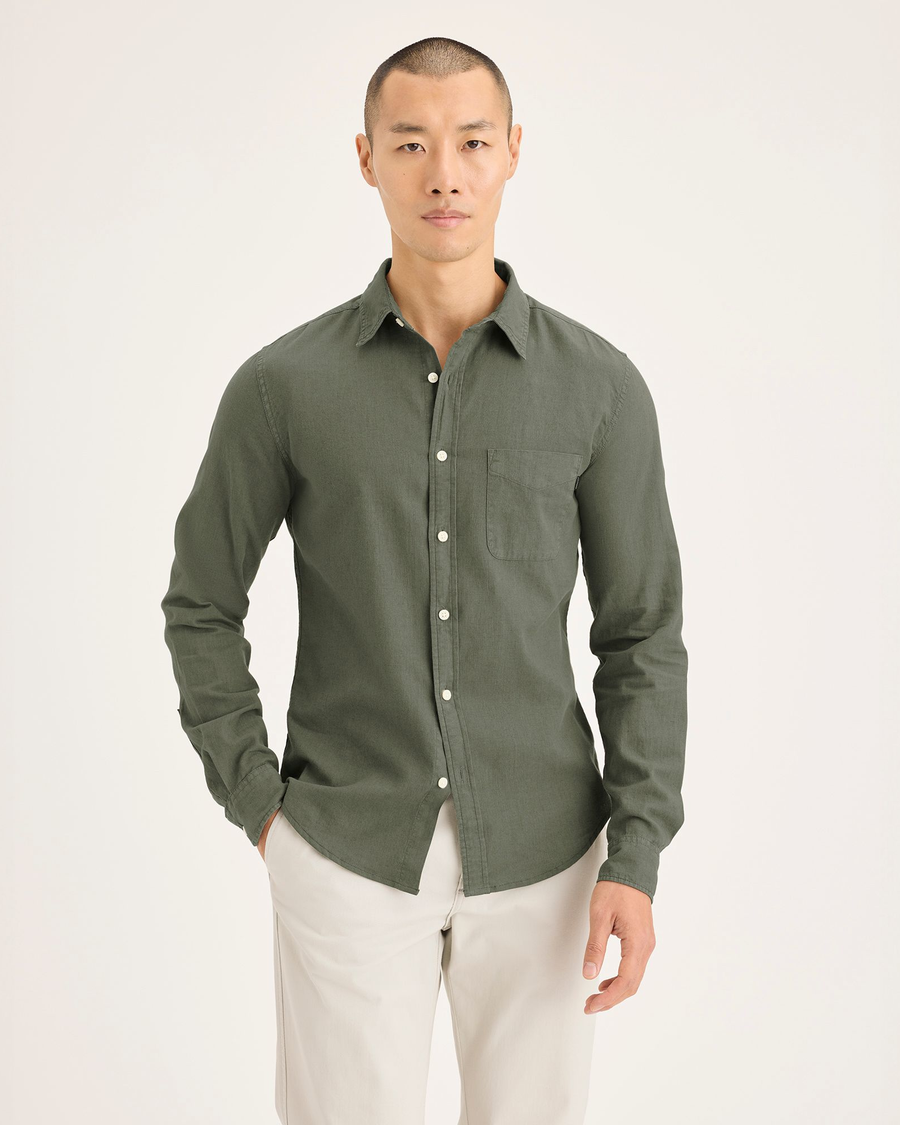 Front view of model wearing Tea Leaf Men's Slim Fit Icon Button Up Shirt.