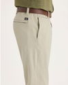 Side view of model wearing Tidal Foam Alpha Chino Pants, Slim Fit.