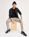 View of model wearing Timberwolf Go Chino, Slim Fit with Airweave.
