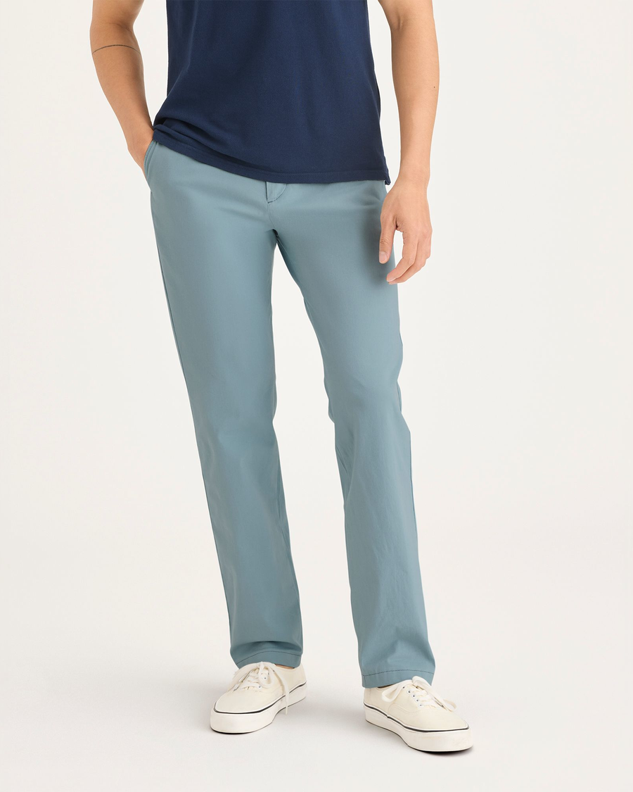 Front view of model wearing Tourmaline Men's Slim Fit Smart 360 Flex Alpha Chino Pants.