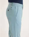 Side view of model wearing Tourmaline Men's Slim Fit Smart 360 Flex Alpha Chino Pants.