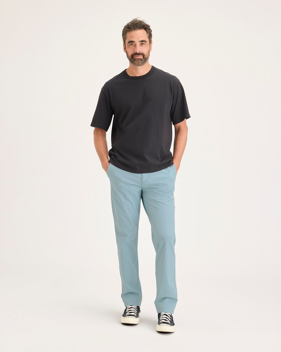 Front view of model wearing Tourmaline Men's Slim Fit Smart 360 Flex California Chino Pants.