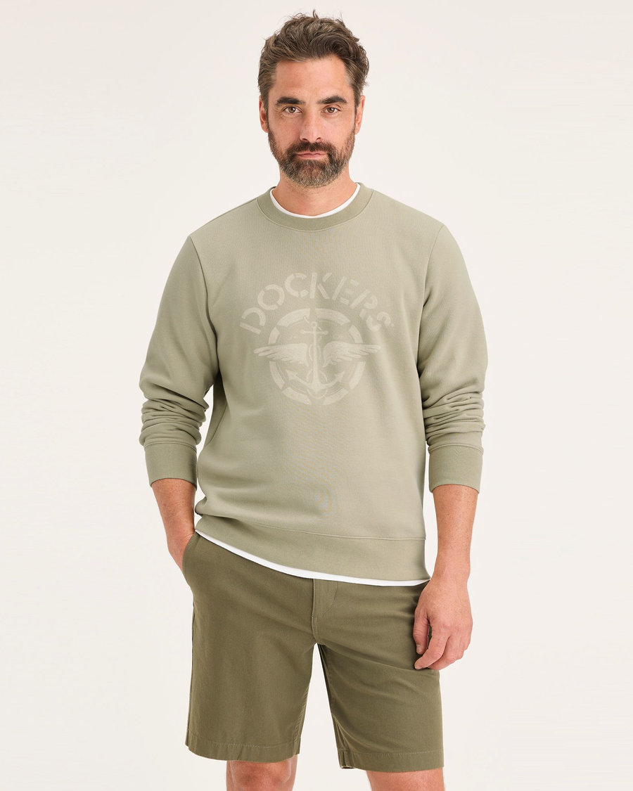 Front view of model wearing Traveler Tidal Foam (Buttercream) Men's  Regular Fit Crewneck Sweatshirt.