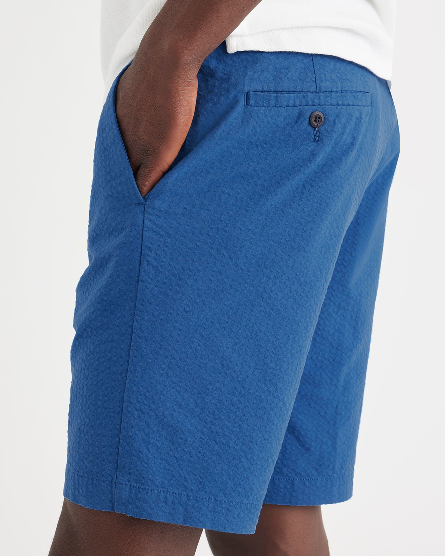 View of model wearing True Blue Men's Supreme Flex Modern Chino Short.
