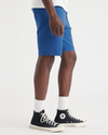 Side view of model wearing True Blue Men's Supreme Flex Modern Chino Short.