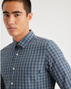 View of model wearing Upstream Vintage Indigo Men's Slim Fit Icon Button Up Shirt.