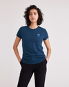 Front view of model wearing Victoria Blue Women's Slim Fit Graphic Tee Shirt.