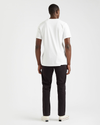 Back view of model wearing White Stencil Graphic Tee, Slim Fit.